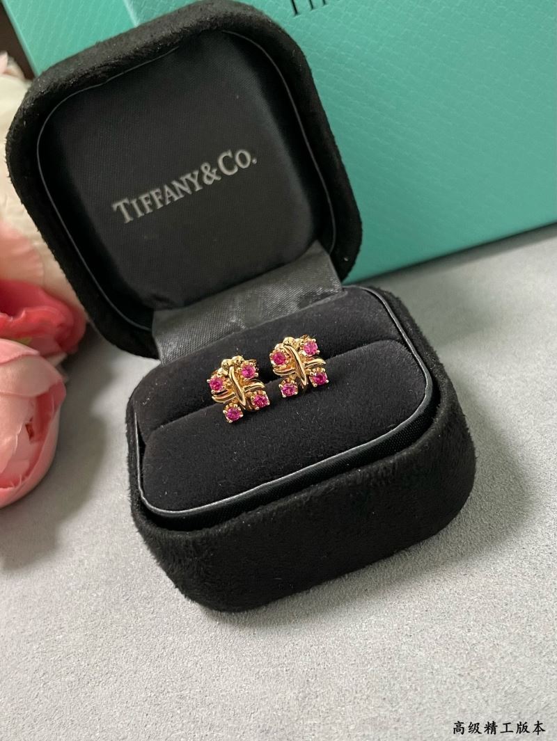 T*f*ny earrings